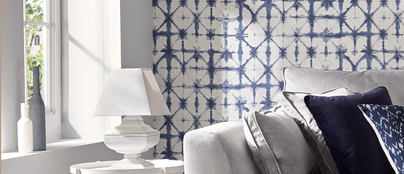 Indigo blue geometric wallpaper in living room